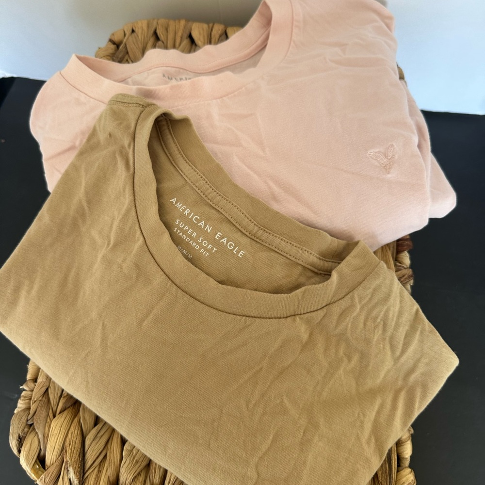 2 mens American Eagle soft tshirts . Tan and pink. Mens medium.